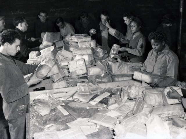 WACs sorting army mail in France in 1945
