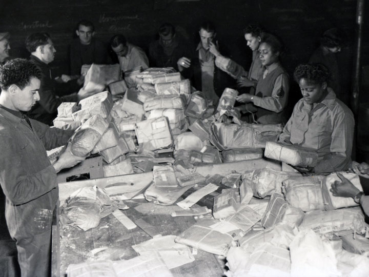 WACs sorting army mail in France in 1945