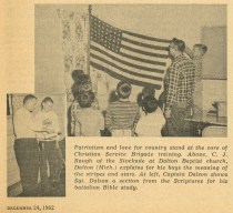 A 1962 Brigade setting demonstrating the patriotic - but still civilian - nature of the organization (December 24, 1962 Standard) - Bethel University Digital Library